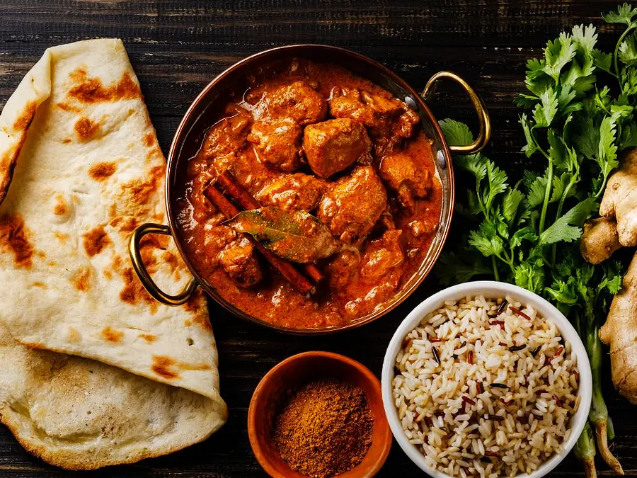 Curry, naan, rice, and herbs for Moss Vale food reviews